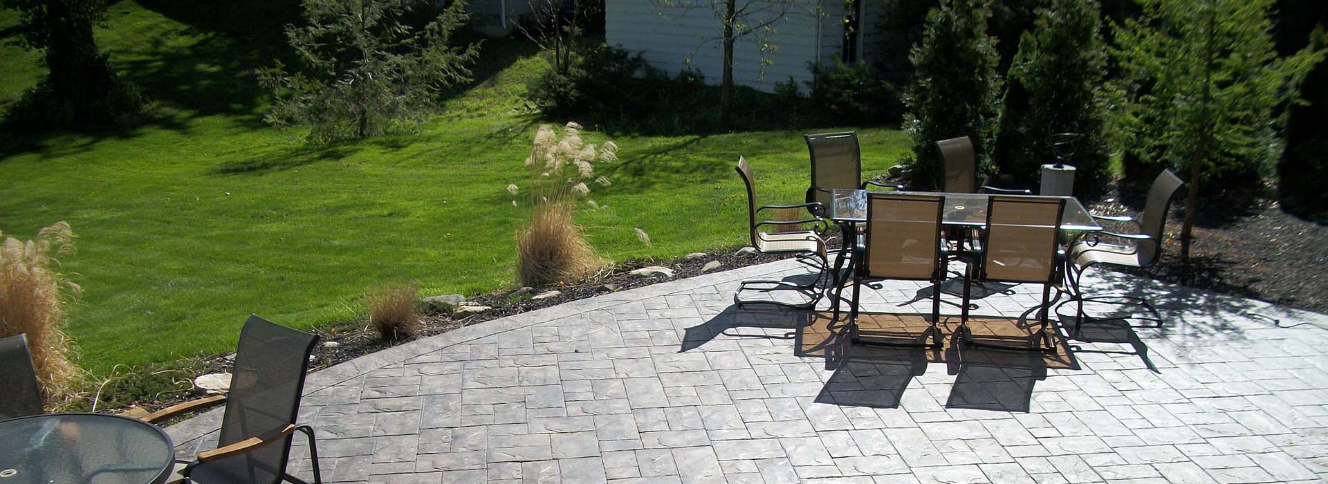 Have decorative colored cement poured and stamped to make a gorgeous outdoor patio or sidewalk in the Upstate of South Carolina
